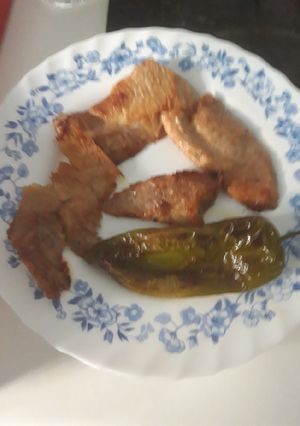 Una foto de Secreto al horno con pimientos asados