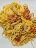 Espaguetis con setas y burrata