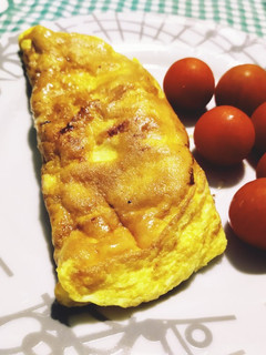 Una foto de Tortilla francesa de pavo rellena de queso fundido