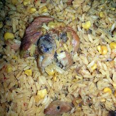 A picture of Arroz con Pollo / Rice with Chicken.