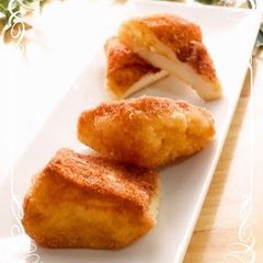 A picture of Voluminous! Fried Hanpen Stuffed with Egg.