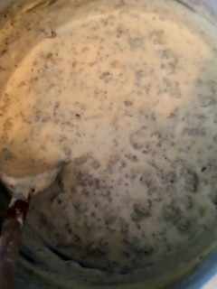 A picture of Biscuits and Sage Sausage Gravy.