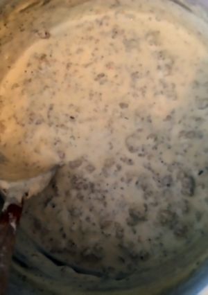 A picture of Biscuits and Sage Sausage Gravy.