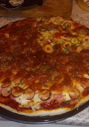 Una foto de Pizza bien peruana y buenasa