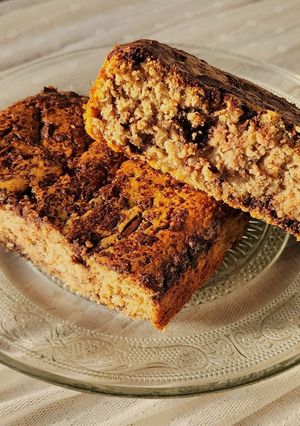 Una foto de 🍌🍫 Baked oats 🍌Receta viral #6 🍌 Budín húmedo de banana, avena y chips de chocolate 🍫🍌