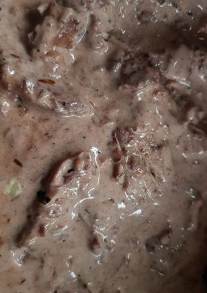 A picture of Chicken thighs in a port, wine and cream sauce.