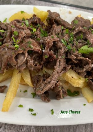 Una foto de Ternera con Papas fritas