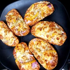 A picture of Garlic bread pizza.