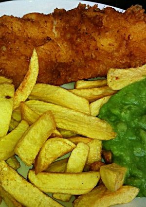 A picture of Tex's Proper Beer-Battered Fish & Chips with Mushy Peas 🐠🍟.