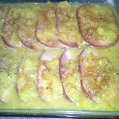 A picture of Baked Ham in orange pineapple dijon glaze.