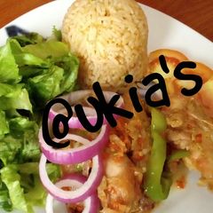 A picture of Simple jollof rice with peppered chicken 1.