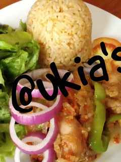 A picture of Simple jollof rice with peppered chicken 1.