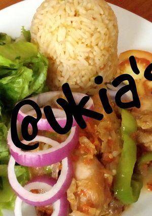 A picture of Simple jollof rice with peppered chicken 1.