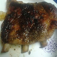 A picture of Rib tips in a cast iron skillet.