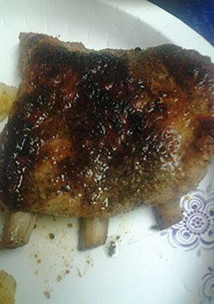 A picture of Rib tips in a cast iron skillet.