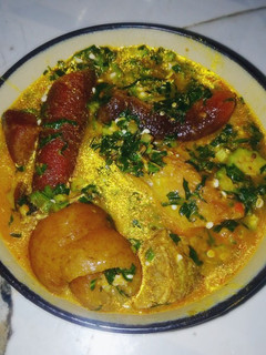 A picture of Ugu and okro soup.