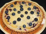 Una foto de kuchen de arandano