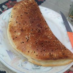 A picture of Cheesy Garlic Nan.