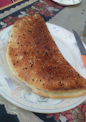 A picture of Cheesy Garlic Nan.