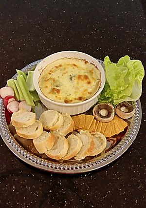 A picture of The Ultimate Crab and Artichoke Dip.