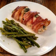 creamy spinach, bacon wrapped chicken breasts A picture of creamy spinach, bacon wrapped chicken breasts.