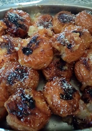Una foto de Peras al horno con caramelo y coco