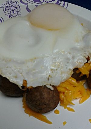 A picture of Eggs Over Cheesy Meatballs.