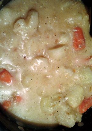 A picture of potatoes and carrots stove top roast.