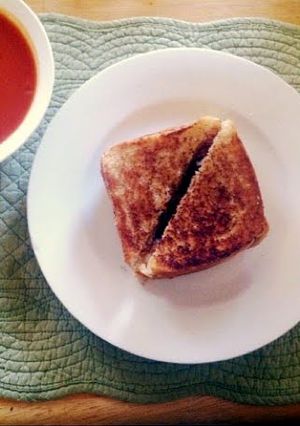 A picture of Grilled Cheese & Tomato soup.