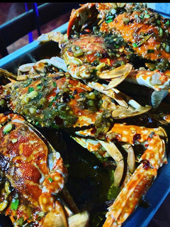 A picture of Soda Pop Seafood Series - Sweet & Spicy Buttered Crabs.