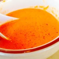 A picture of Homemade Tomato Soup With Basil.