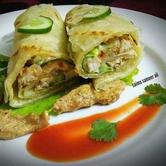 Creamy chicken roll paratha with mayo garlic sauce A picture of Creamy chicken roll paratha with mayo garlic sauce.