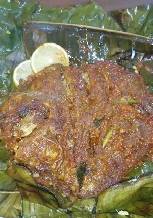 A picture of Meen pollichathu/ Fish fried in banana leaf wrap.
