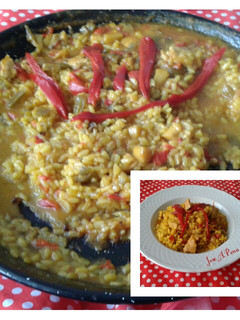 Una foto de Arroz meloso con pechuga y sepia