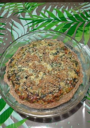 Una foto de Tarta de ricota y acelga con masa de harinas varias