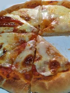 Una foto de Masa de pizza casera c/pureza