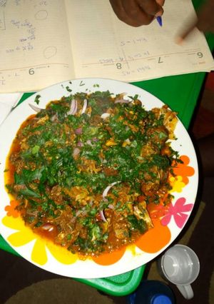 A picture of Isi-ewu with utazi leaves.