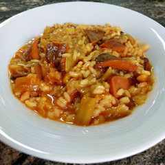 Una foto de Arroz meloso con rebollones