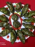Prawn stuffed spinach momo