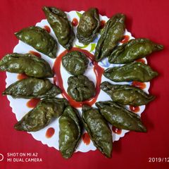 A picture of Prawn stuffed spinach momo.