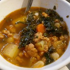 A picture of Sausage, bean, kale stew.
