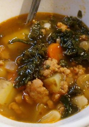A picture of Sausage, bean, kale stew.