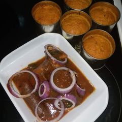 A picture of Alelen Gongoni... served with Cowleg Stew.
