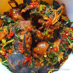 Vegetable sauce with snails and pomo A picture of Vegetable sauce with snails and pomo.