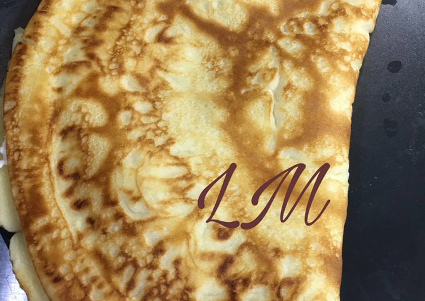 Creps rellenas de queso de cabra y cebolla caramelizada