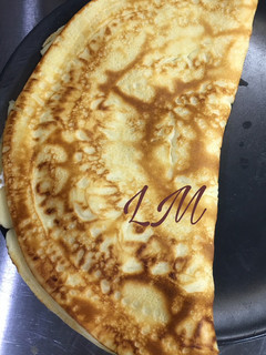 Una foto de Creps rellenas de queso de cabra y cebolla caramelizada