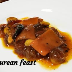 A picture of Tomato amsotto khejurer chutneynTomato mango leather and date jam.