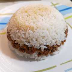 Una foto de Arroz tapado