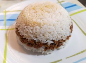 Una foto de Arroz tapado
