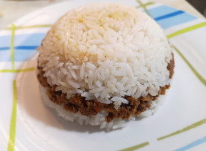 Una foto de Arroz tapado
